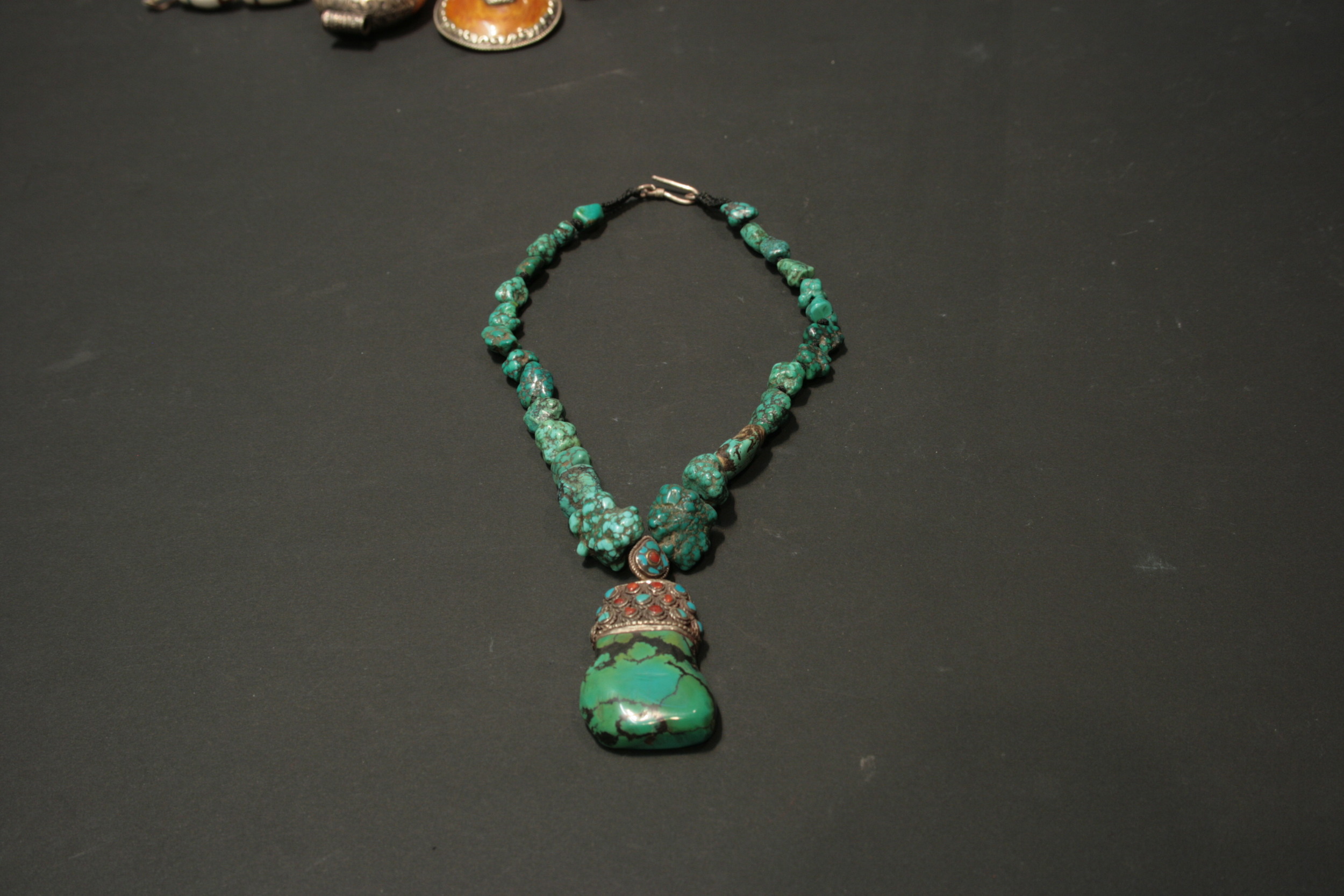 Old Tibetan turquoise with silver and coral