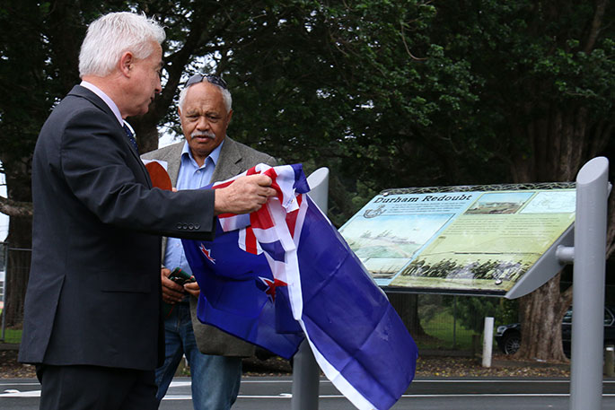 Tauranga Mayor Greg Brownless unveiling the plaque with Pukehinahina Charitable Trust project director Buddy Mikaere. Photos: Tracy Hardy.