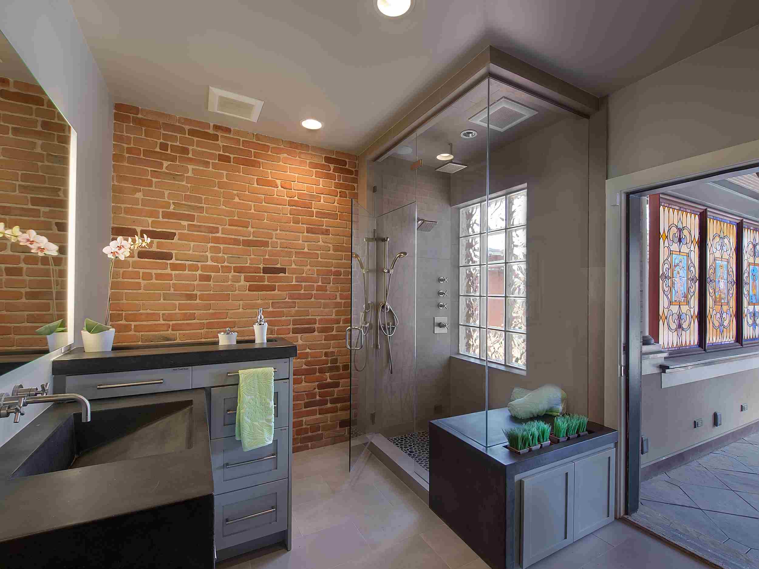 exposed brick and concrete — sanctuary kitchen and bath desi-1.jpg