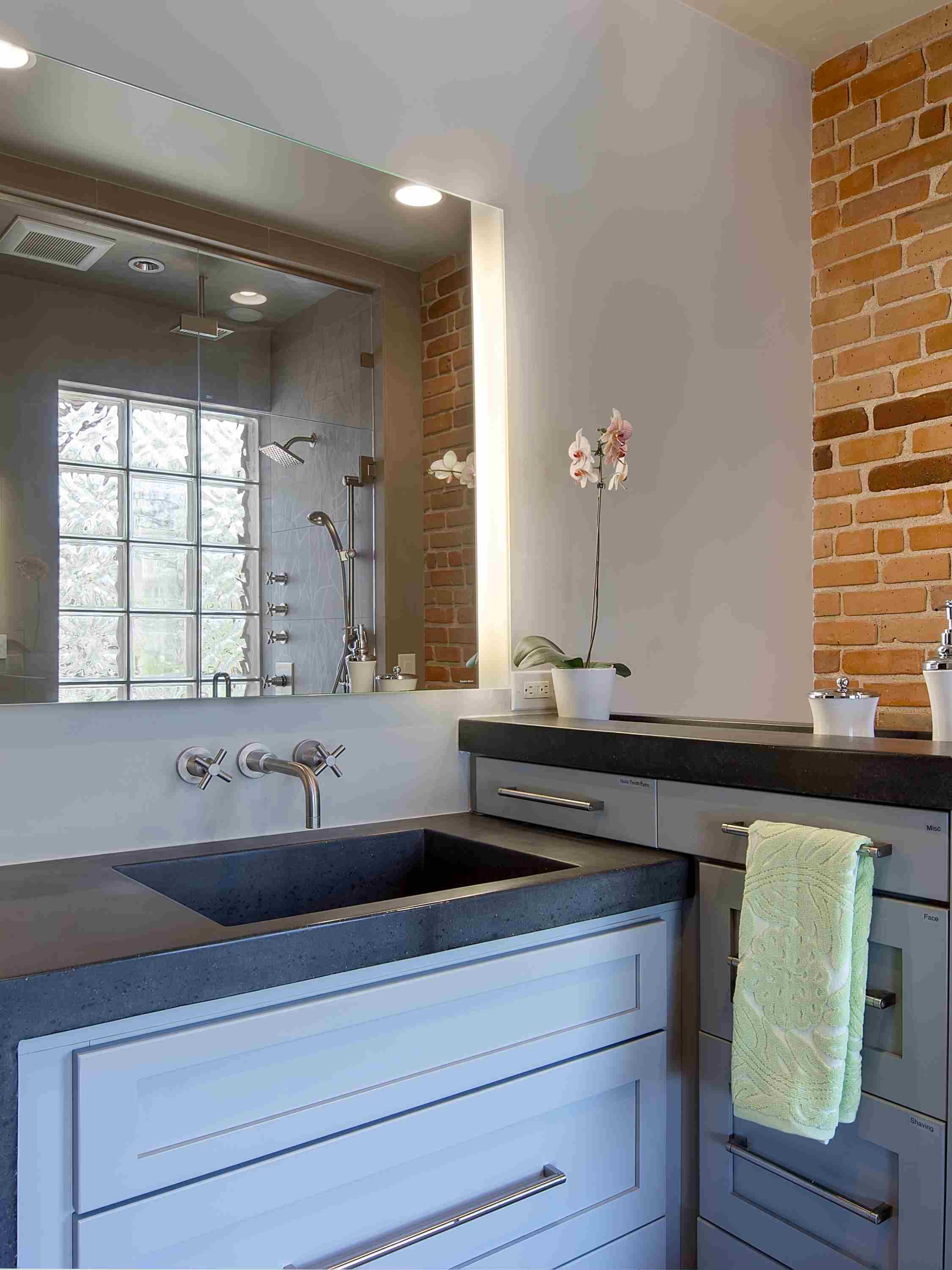 exposed brick and concrete — sanctuary kitchen and bath desi-2.jpg