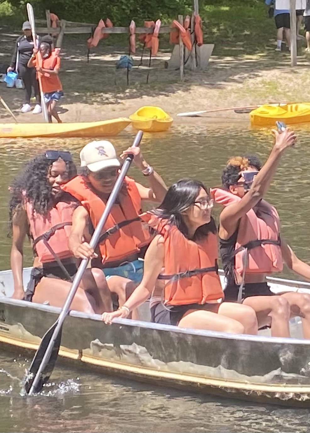  Students rowing a boat at Holiday Hill 