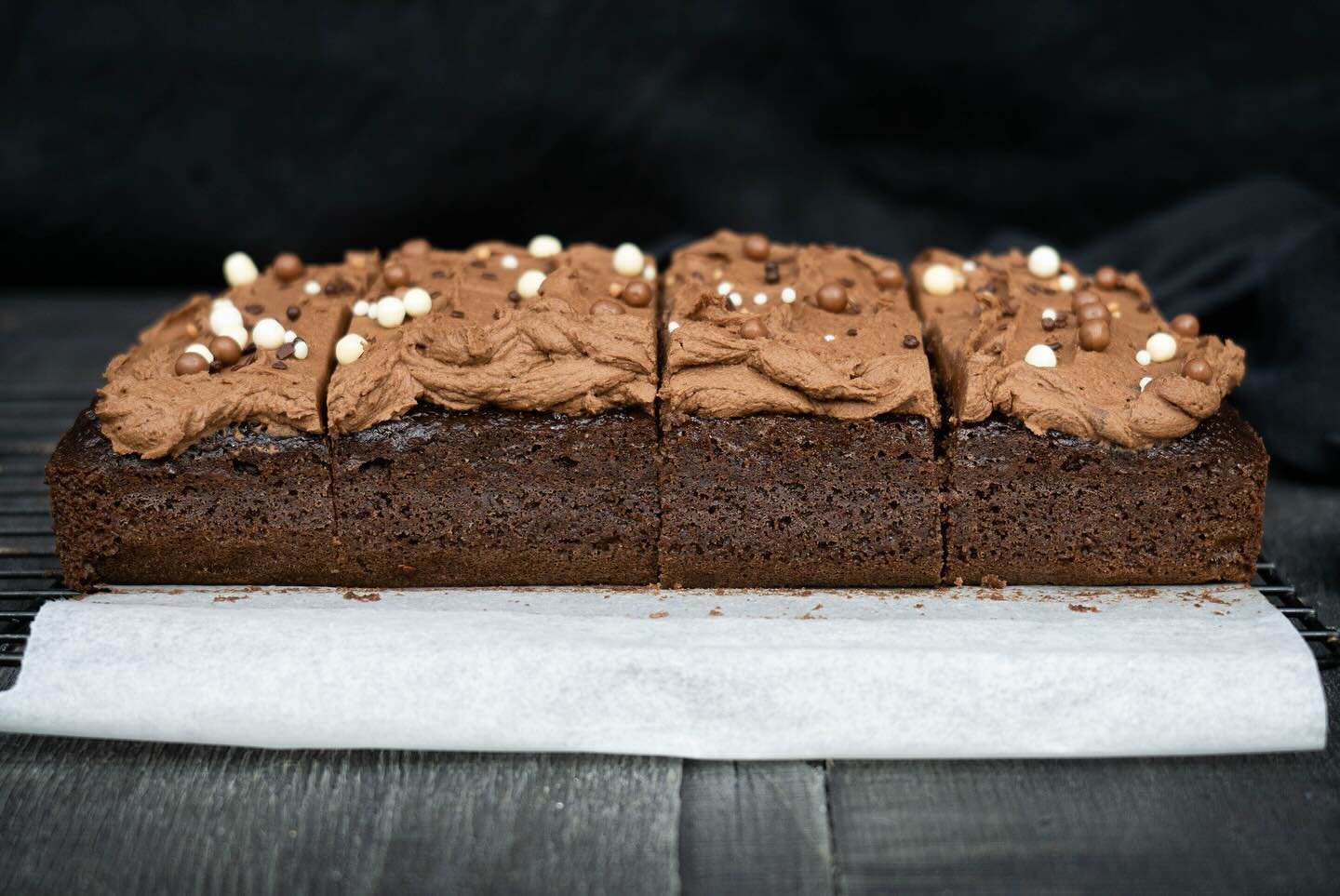 A teeny, tiny little chocolate sheet cake. It bakes in a loaf pan and makes six slices, just enough for a small group, or for two hungry people. Ideal when you need some chocolate cake, but don&rsquo;t want cake leftovers for days. 

This cake used b