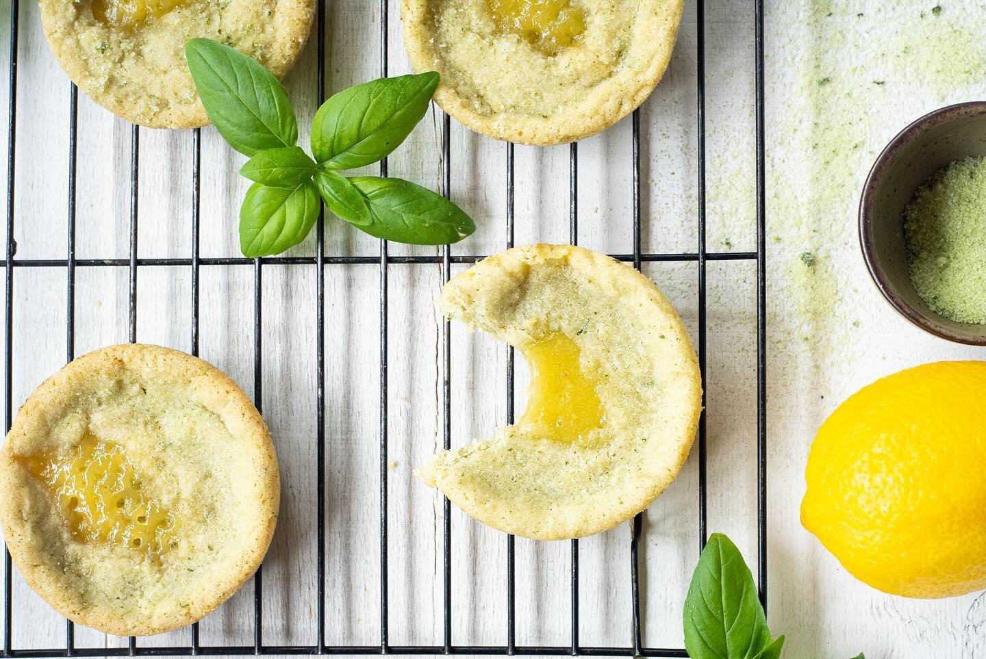 These bright and sunny cookies are stuffed full of tart lemon curd, and slightly vegetal from a good amount of basil pulsed into the sugar. The result is a chewy, herbaceous cookie that bursts with gooey lemon centres. Link in bio or here www.theverd