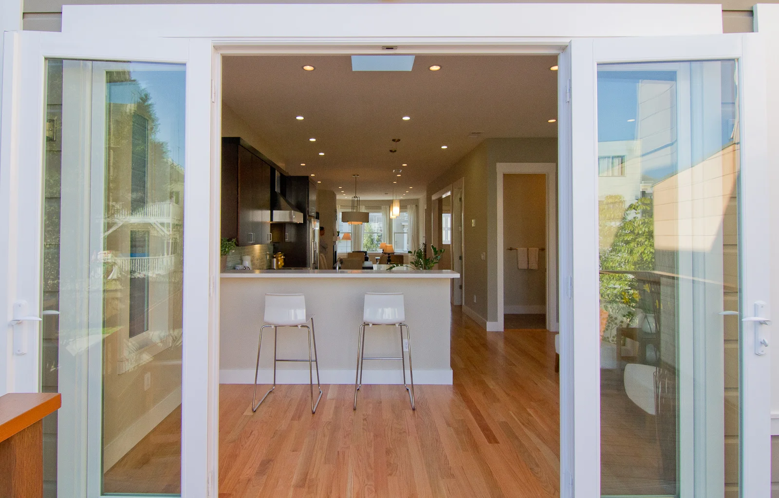 Whenever possible, let the fresh breezy air in with open doors.