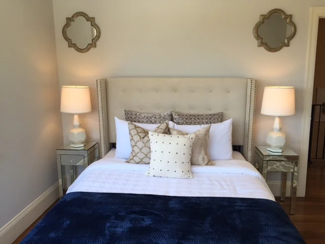 A bedroom was decorated to symmetrical perfection.