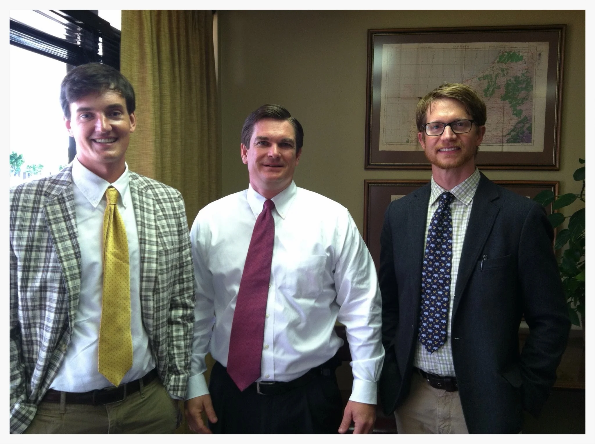 Donn Cooper, U.S. Representative Austin Scott, and Michael Wall, Georgia Organics Director of Programs