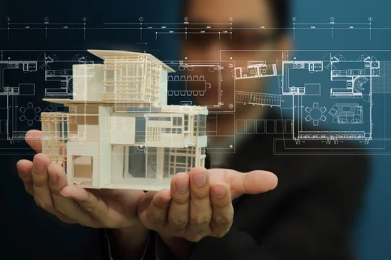 businessman-present-house-model-and-plan-on-touch-screen.jpg