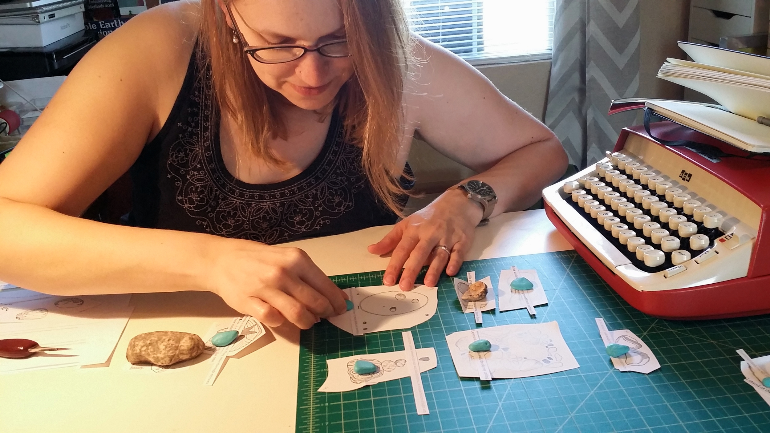 Our writing process: Pairing image with text, holding them down with painted rocks. Not very official, but super fun and intuitive.