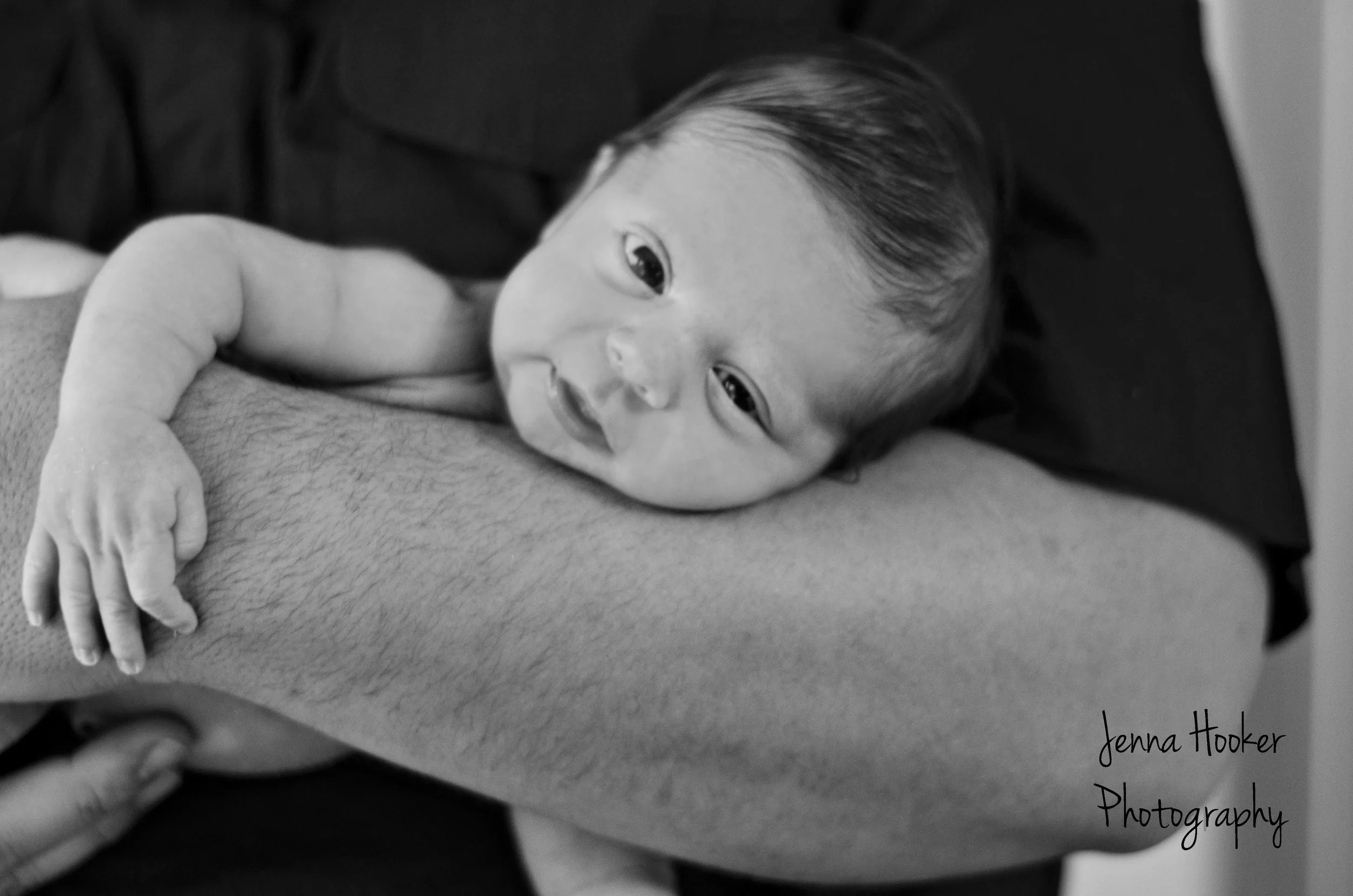 baby in daddy's arms