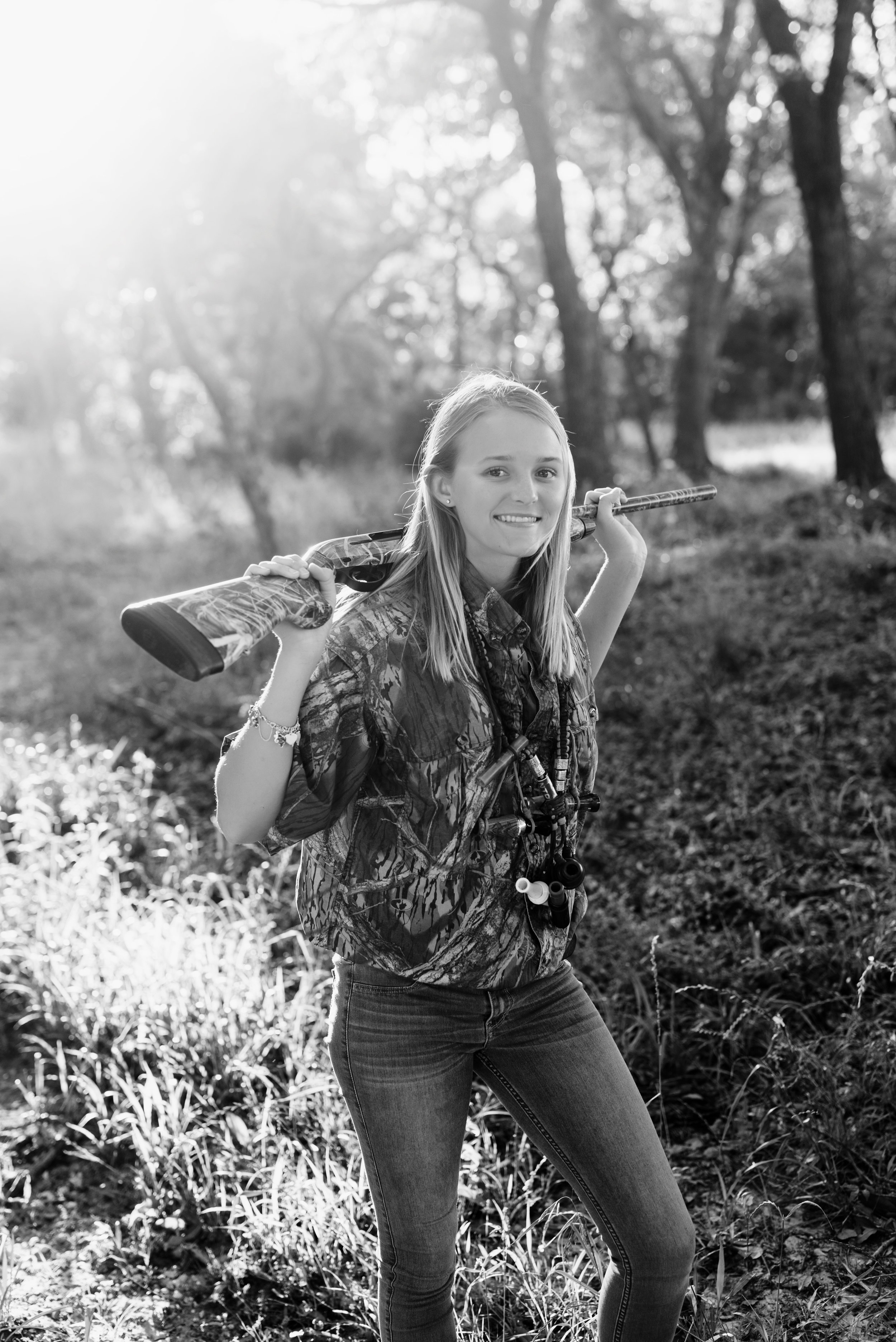 senior girl with gun photos