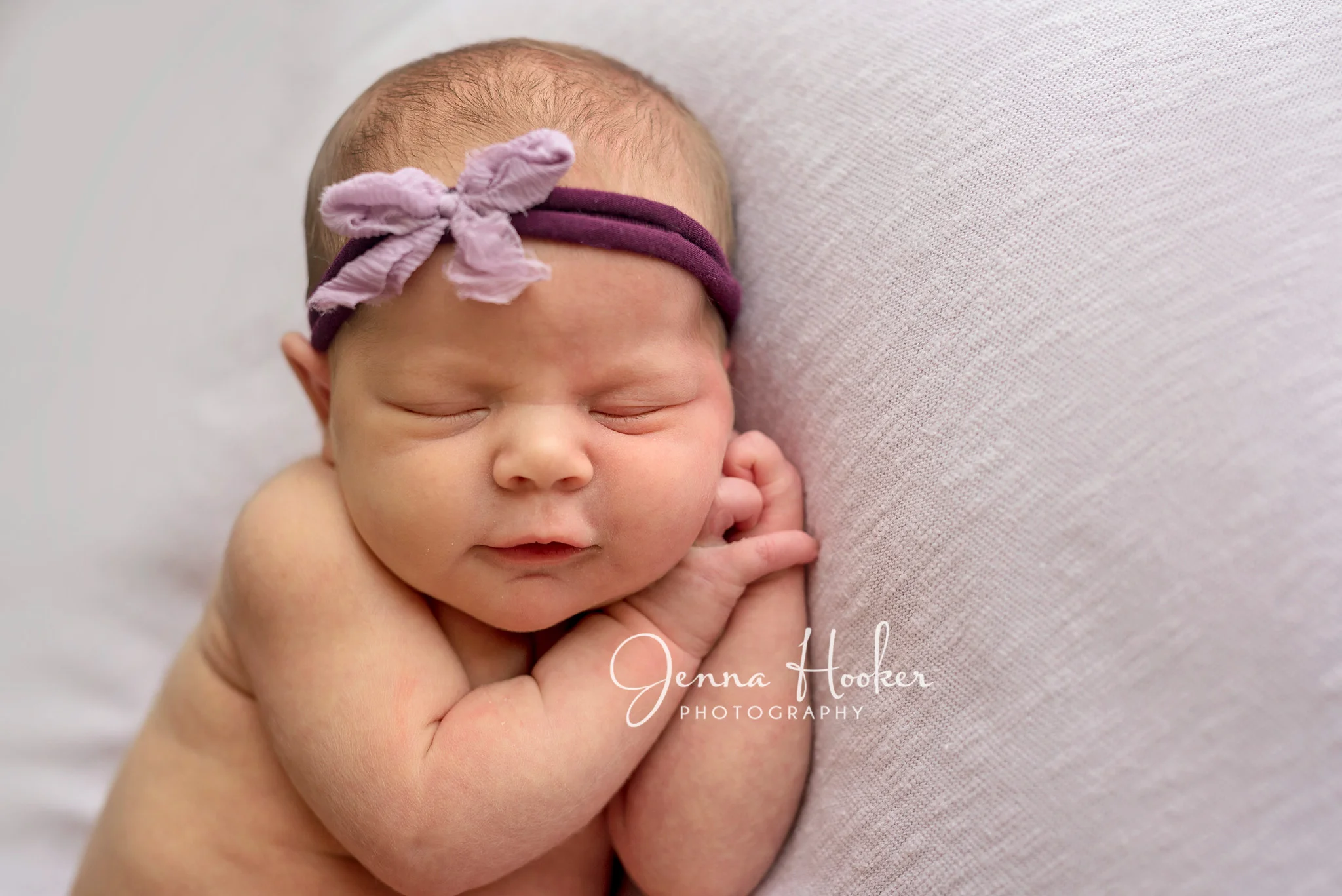 bow and newborn baby girl