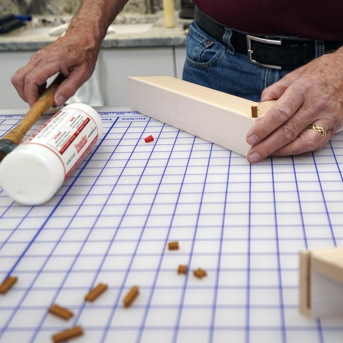  The nicest thing about these dovetail corners is that, compared to various V-nail and clamping alternatives, they make frame assembly very easy, even with larger frame legs. After a bit of glue is applied to one side of a corner, the plastic keys ar