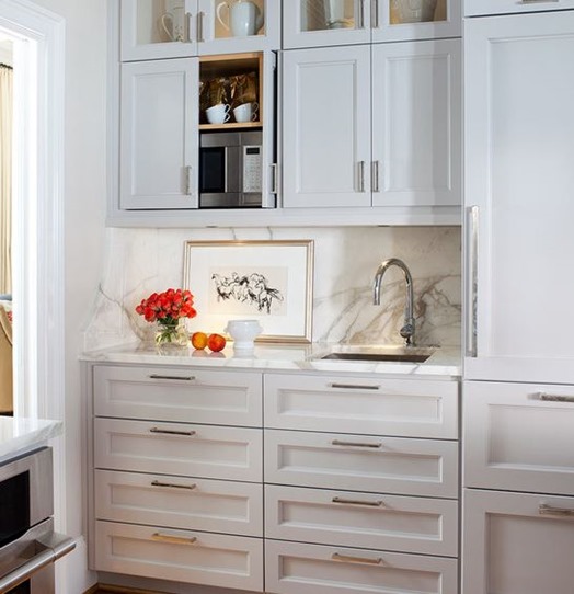 high up in the upper cabinet; image via Terra Cotta Properties