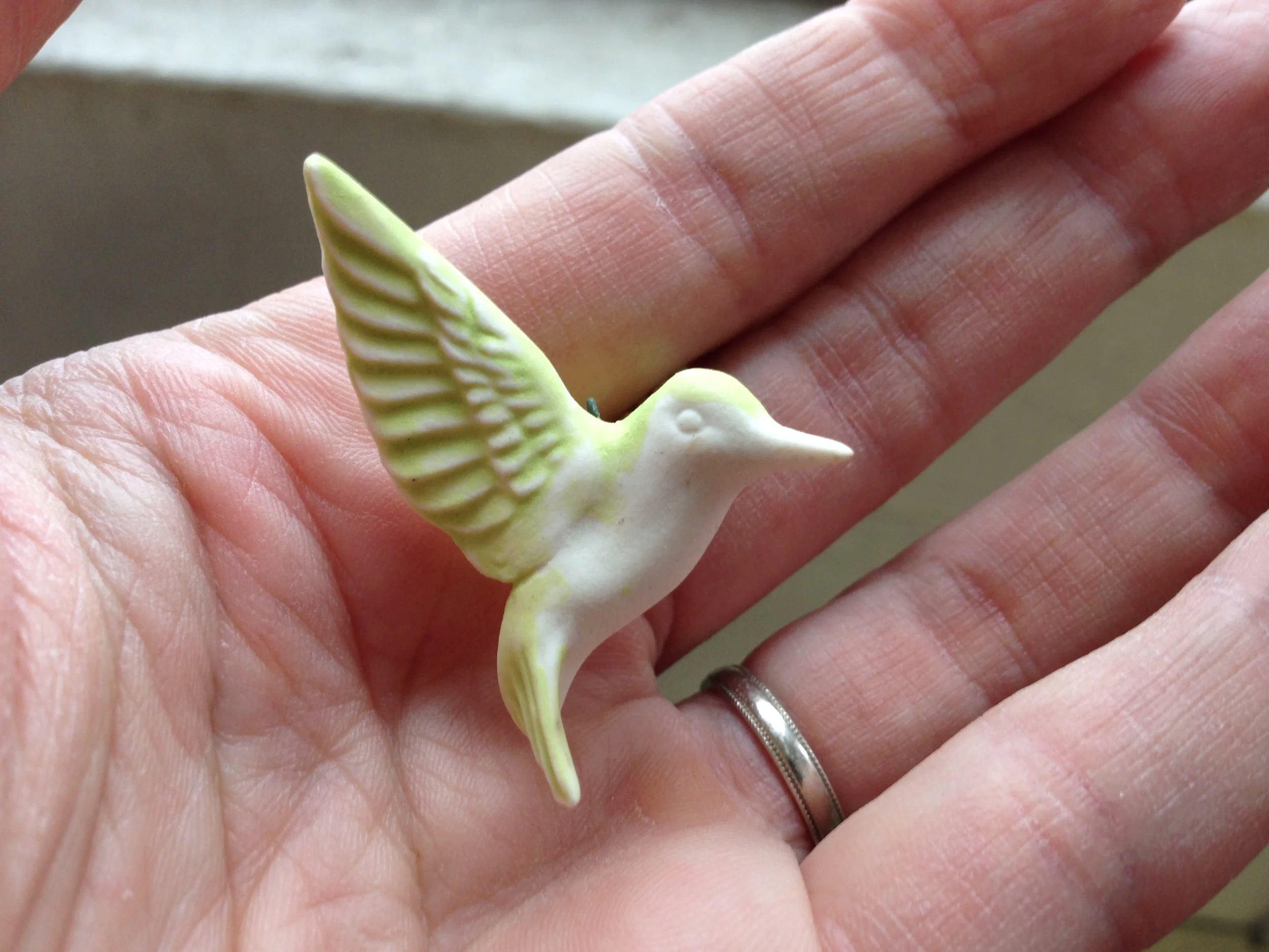 hummingbird with green underglaze
