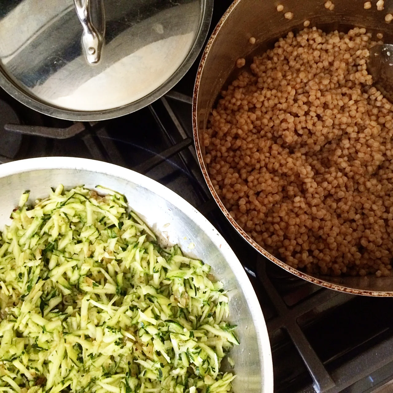 I added the zucchini, and more s+p, to the onions & garlic. I cooked it on high heat so the water would evaporate quickly, leaving the zucchini with some bite ( not overcooked and mushy). Simultaneously, I cooked two cups of couscous following the directions on the package .