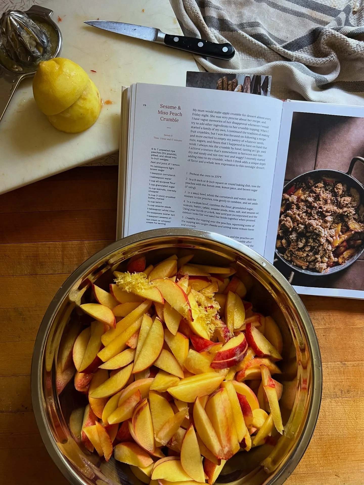 First little wave of peaches gathered. Half to my prep* for Cookbook Club at my local public library, half to the grateful #ArdenPigs.
*The theme is “Farmers Market” and I’m making Rachel Simons’ Sesame & Miso Peach Crum