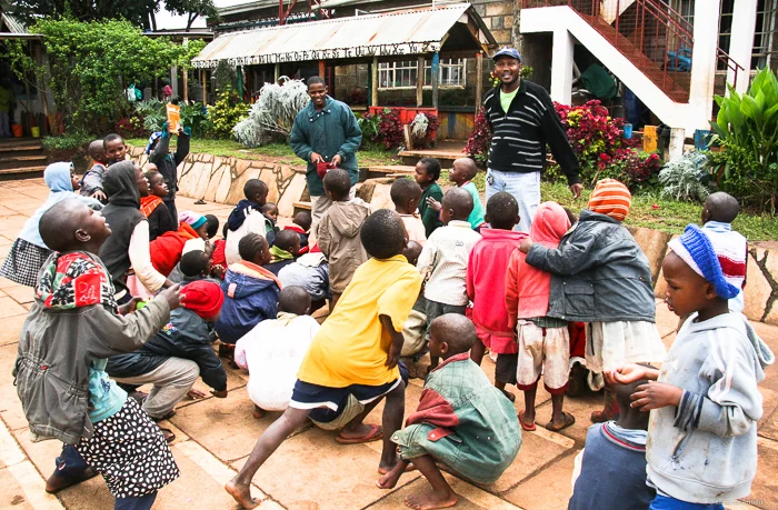 LCC Founder and Director, Patrick Mungai, and the kids whose difficult lives had a little luck, to have landed in this caring place. 