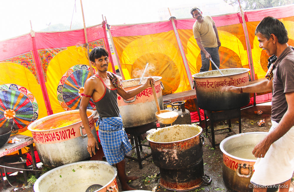 Preparing basic food like dhal and rice at a temple in the middle of busy Jaipur streets.
