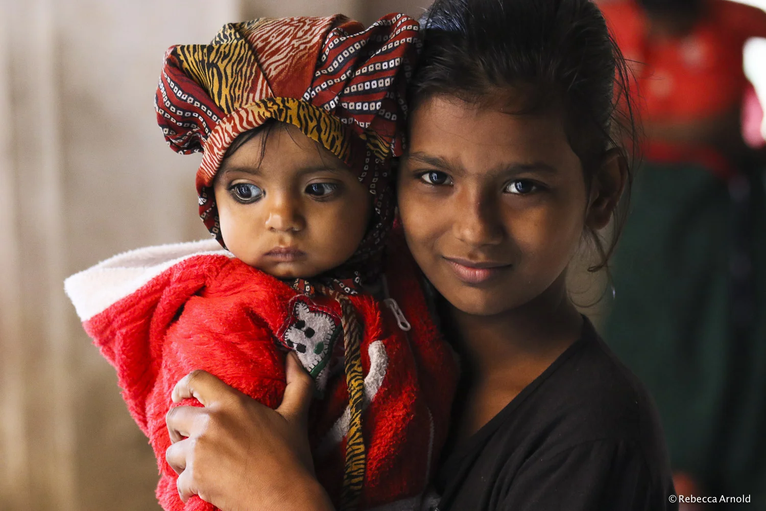 Girl with Baby, India 2015 16" x 24" | 24" x 36" | Custom Sizes Archival Pigment Prints Edition: 150