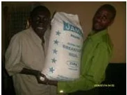 Justin was very happy to receive a bag of mealie meal for home consumption
