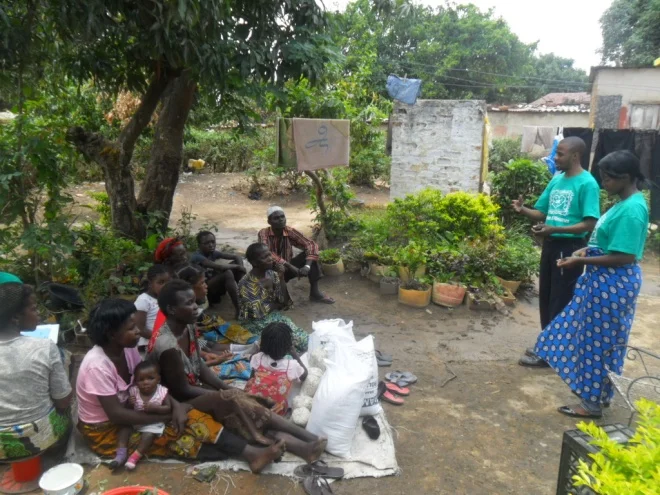 Stanley (r) introducing Mwiche Chomba (l) to our TB/HIV clients in Buchi community
