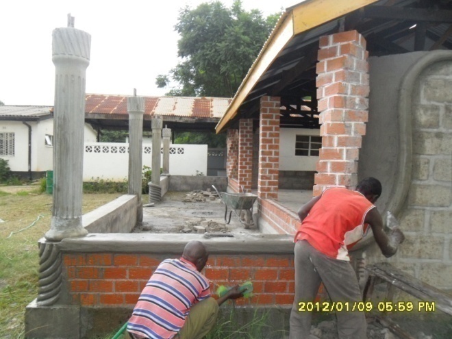 Stanley senior (Stanley’s father) and Cliff building and decorating the skirting on the corridor and redesigning the columns