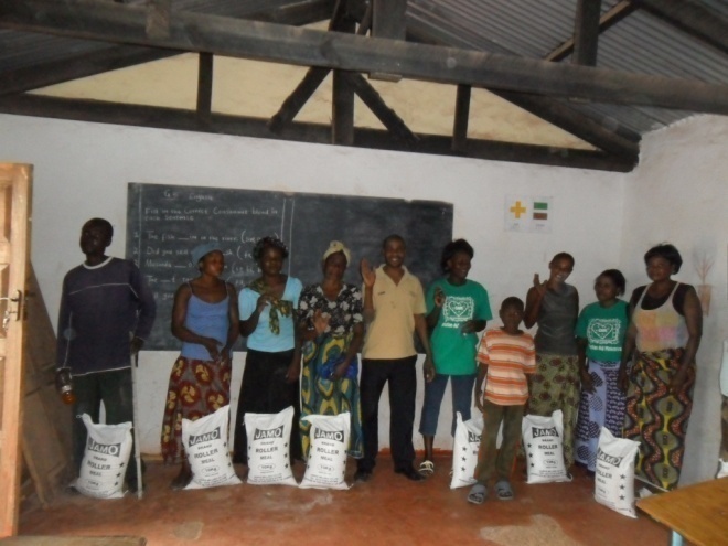 Christian Aid Ministries giving food to patients in St. Anthony community on Friday 10th February 2012