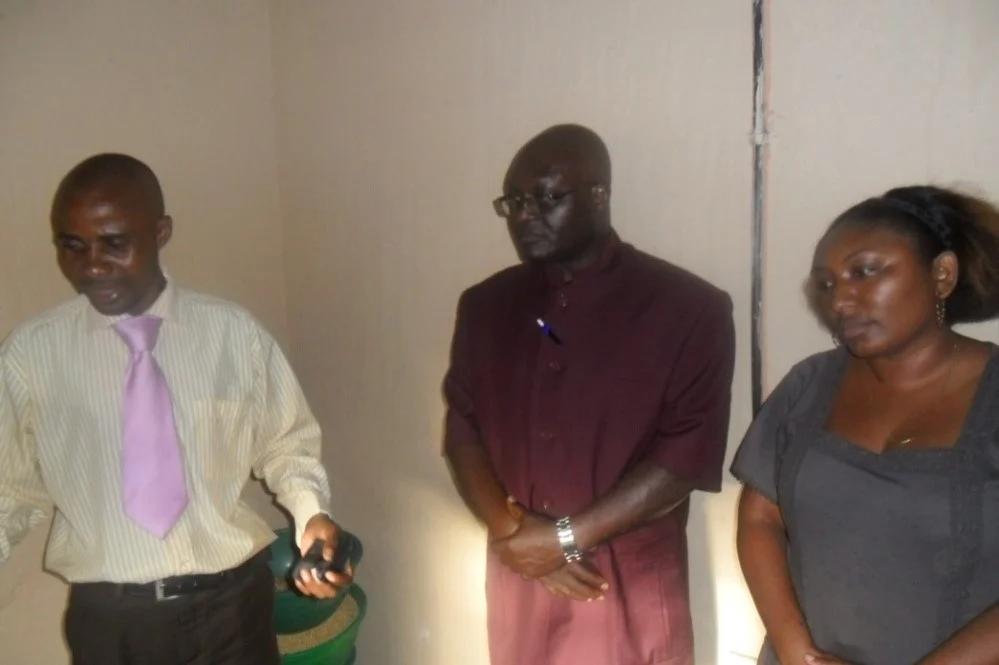 Mr. Mulenga Stanley (left) explaining to Honorable Deputy Minister of Education Dr. Boniface Kawimbe (right) at CAM office at 3038 in Kwacha East Kitwe how Christian Aid Ministries is working hard in partnering with the Zambian government to alleviate TB and HIV/AIDS in kitwe on the Copperbelt