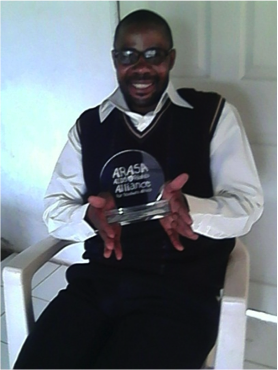 Stanley Mulenga, winner of the ARASA 2014 Trainers Trainer of the year and the Director of Christian Aid Ministries Kitwe - Zambia
