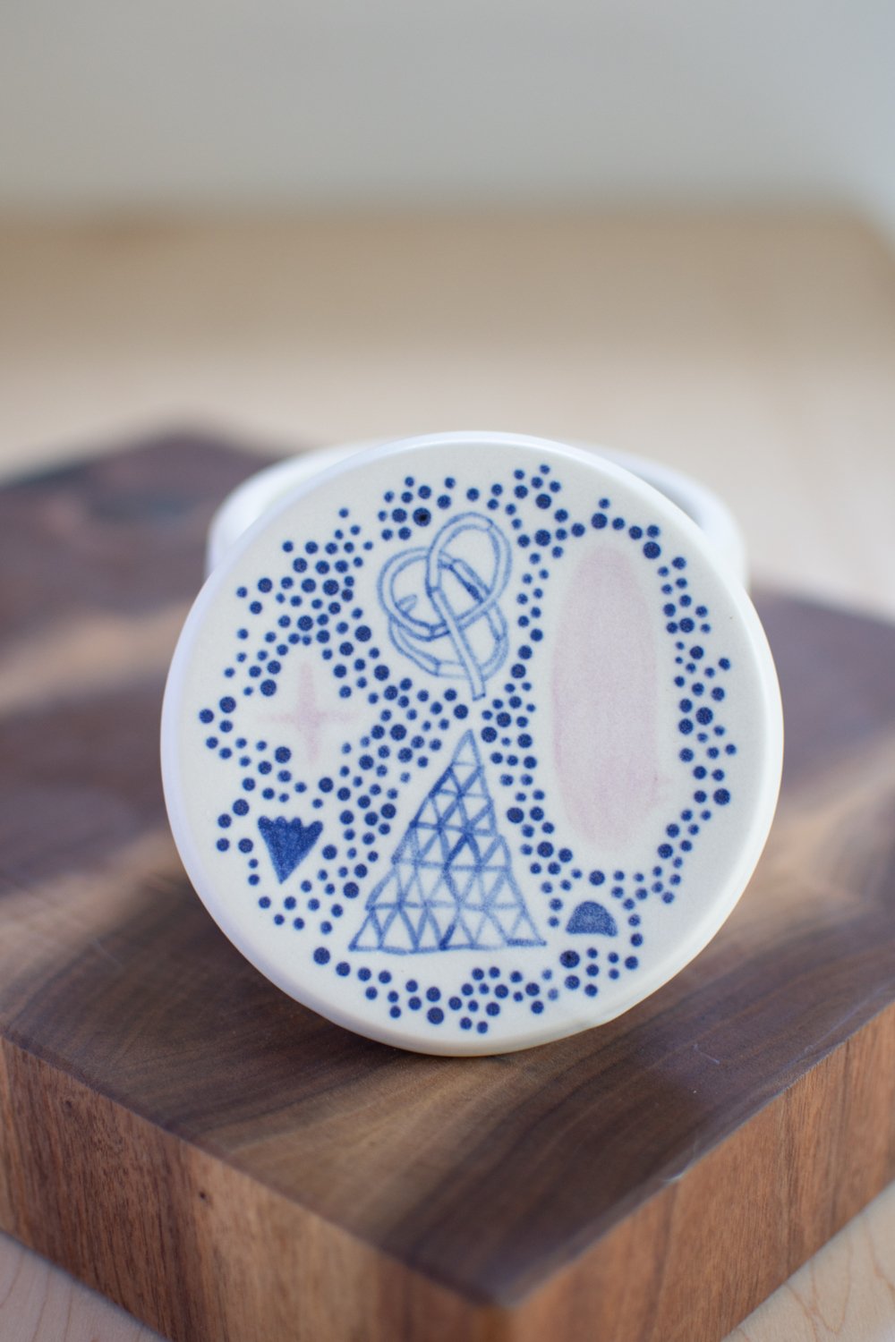 Blue and lilac lidded jar by Eleanor Annand.