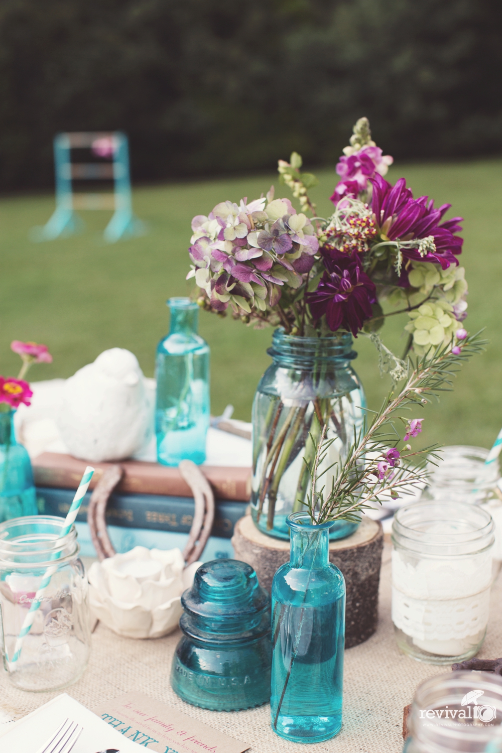 Old mason jars and vintage glassware as centerpieces for weddings