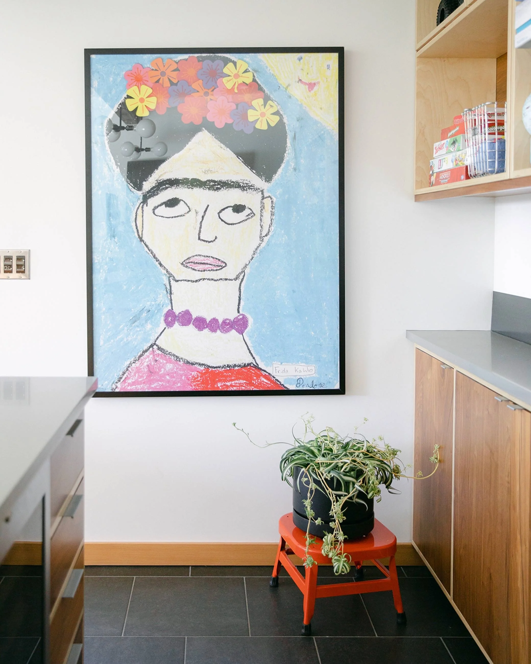 A child's artwork re-scaled and installed in a residential kitchen.