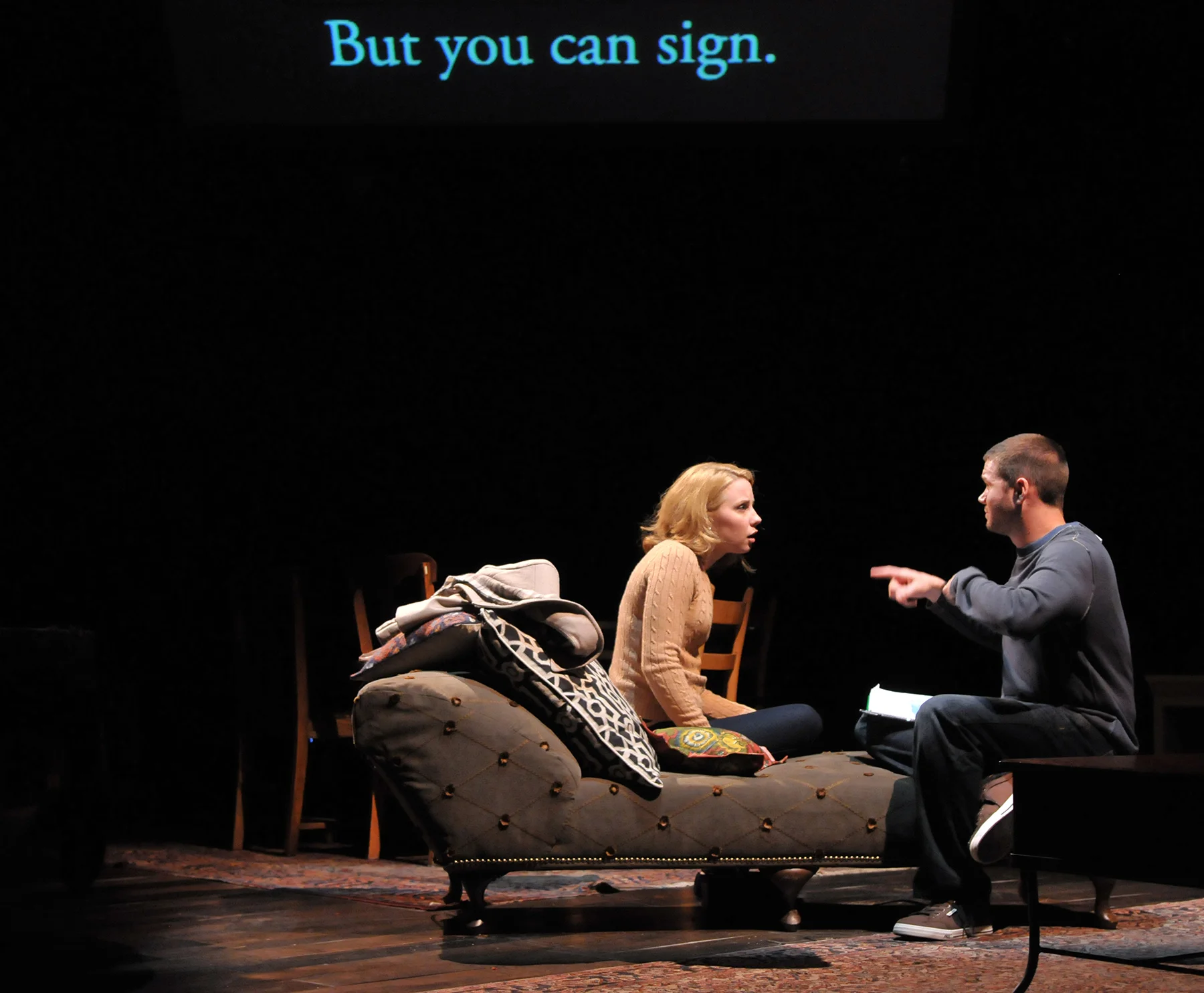 Erica Spyres and James Caverly in the SpeakEasy Stage Company production of TRIBES directed by M. Bevin O'Gara. Photo: Craig Bailey / Perspective Photo