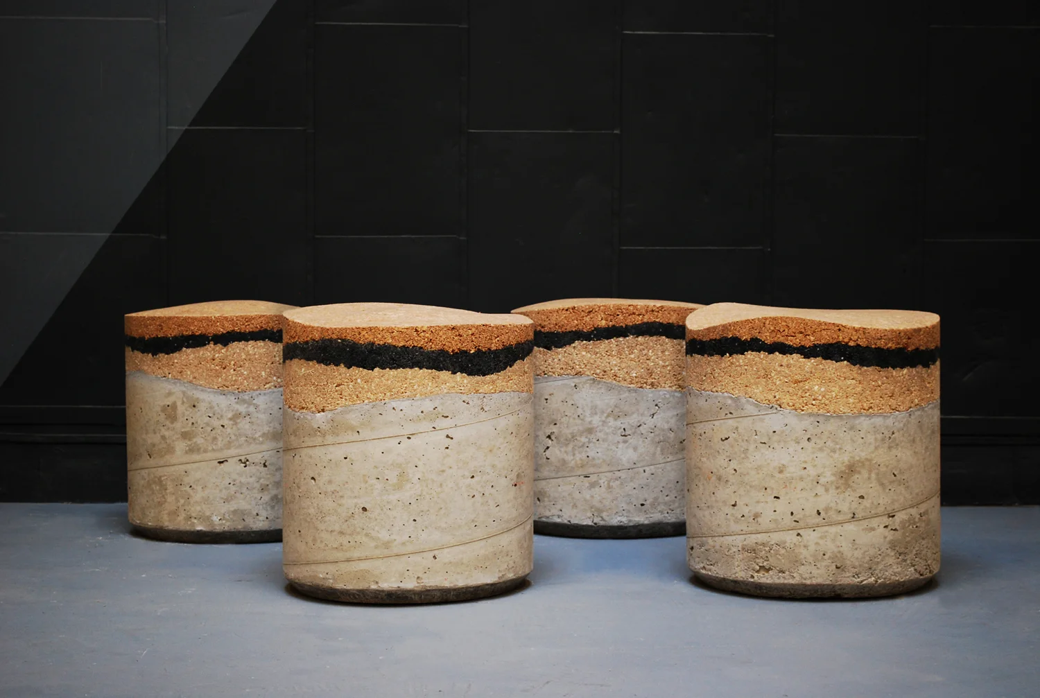 Inspired by stratum and the stratigraphy drawings, STRATA recreates the look of quarry core samples with 95% re-purposed materials. 
