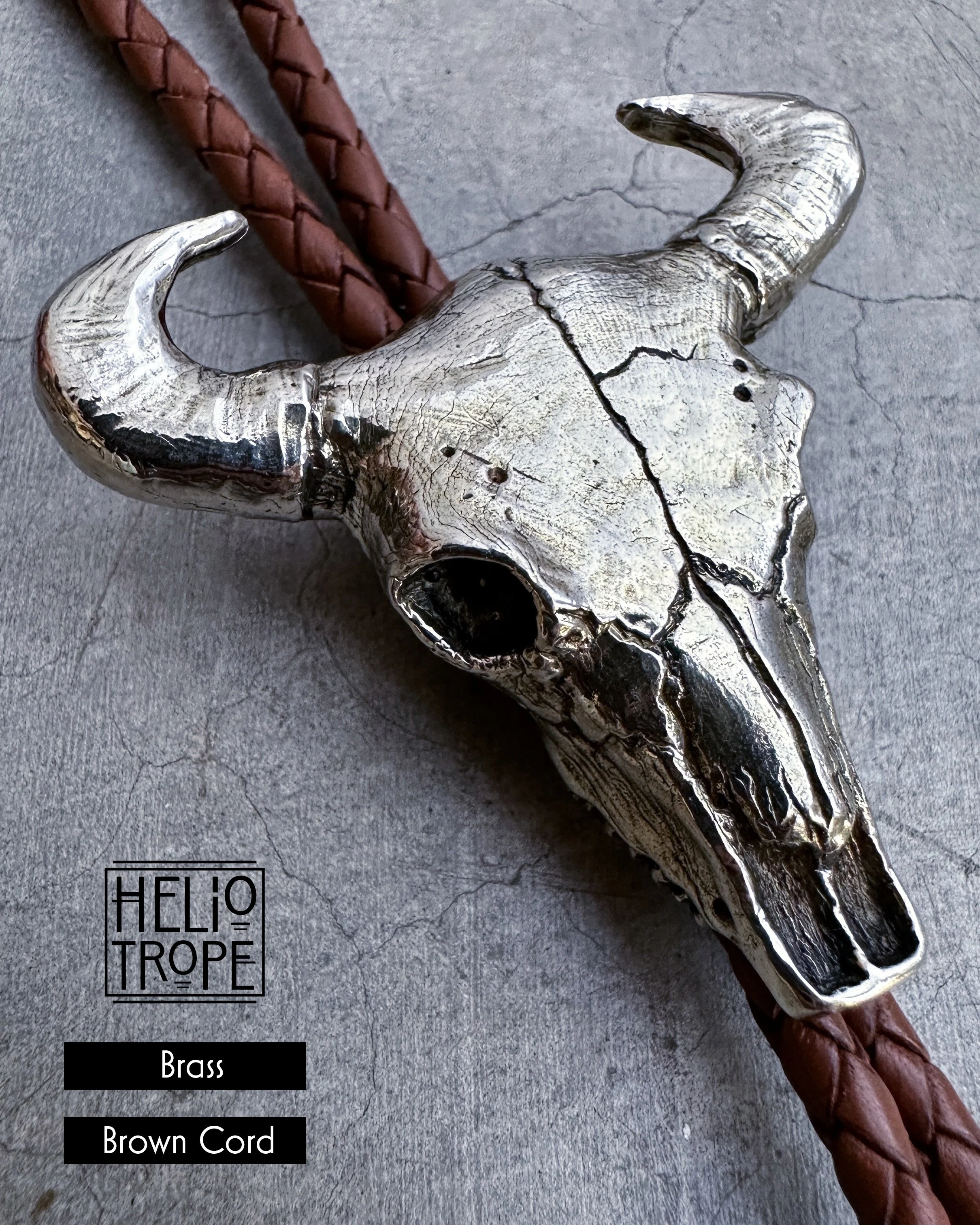 FullSizeRender_VSCO 10 bull skull bolo - white bronze side close.jpg