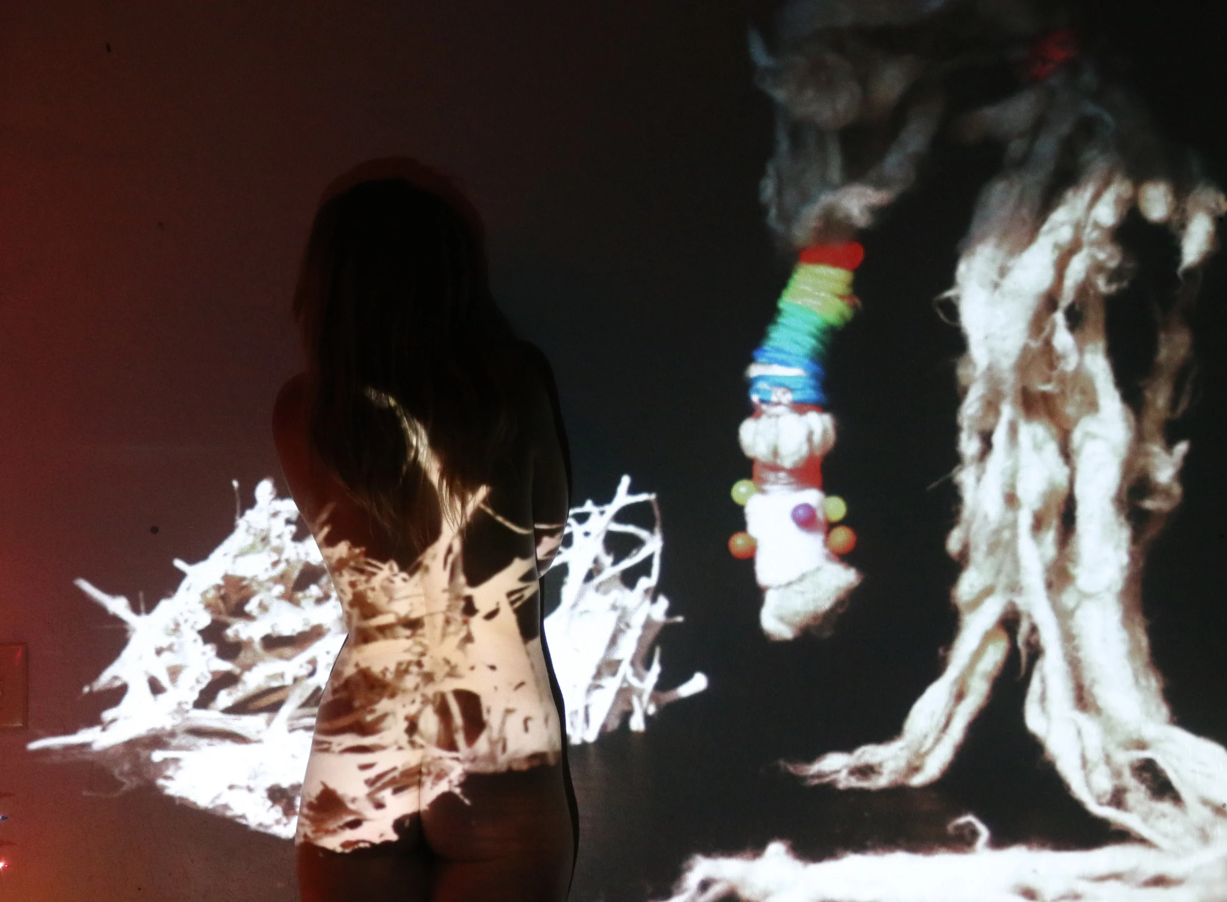  I projected old photographs on the wall and rephotographed them with my current self in the memory. 