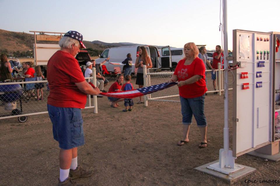 Event organizers Bob & Debbie Golk fold the flag at sunset. Not shown are organizers Wayne Sewell & Ron Burgess. Thank you for your effort organizing a great event!