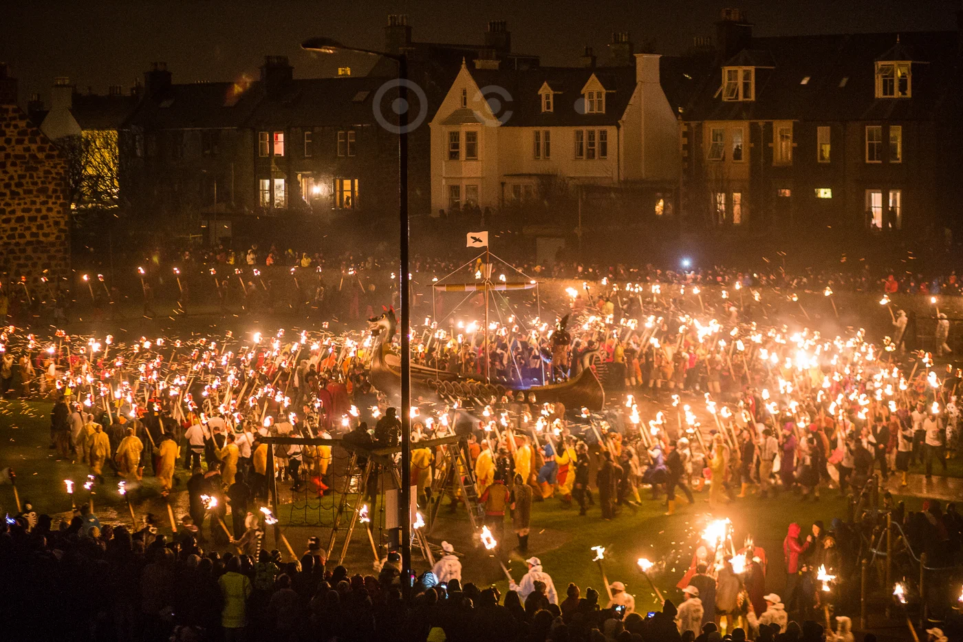 The guisers assemble for the burning.