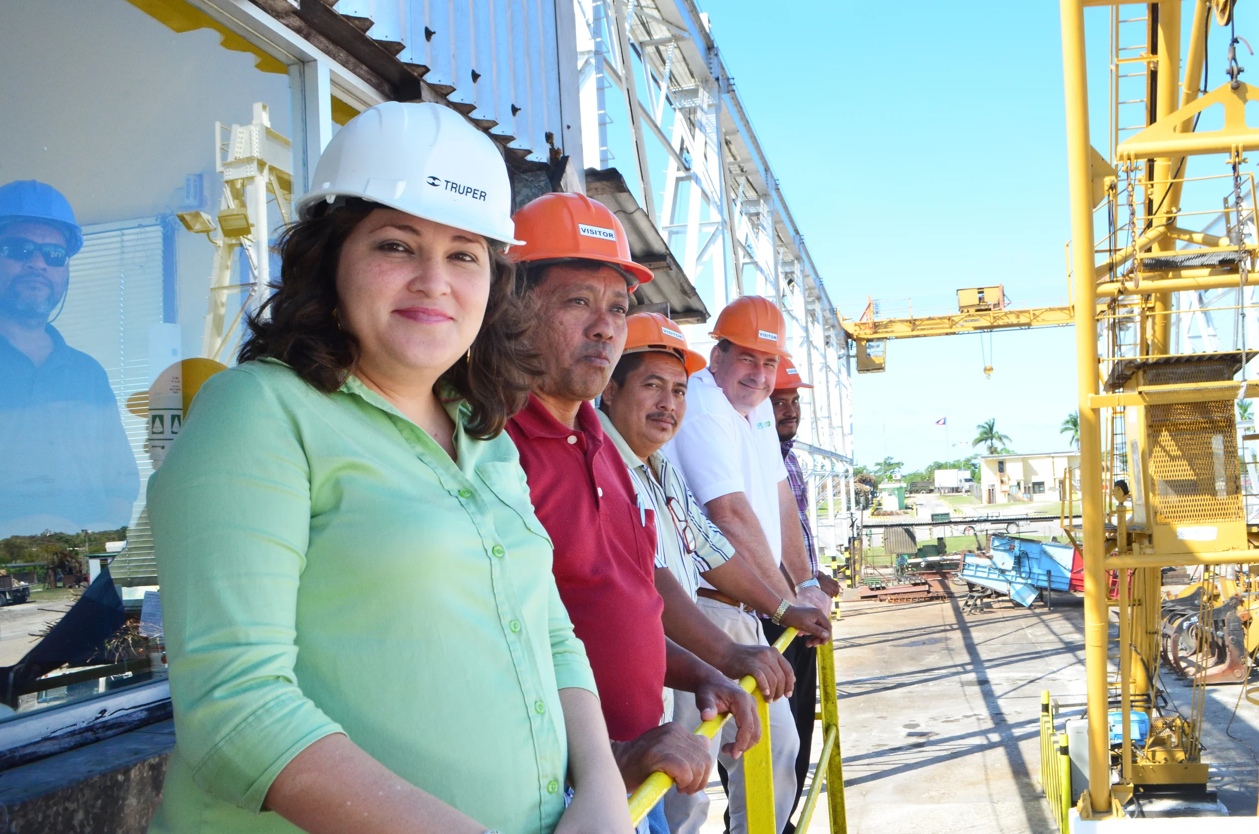 Mac McLachlan, Vice-President of International Relations & Olivia Avilez, Cane Farmers Relations with farmers at the Cane Yard