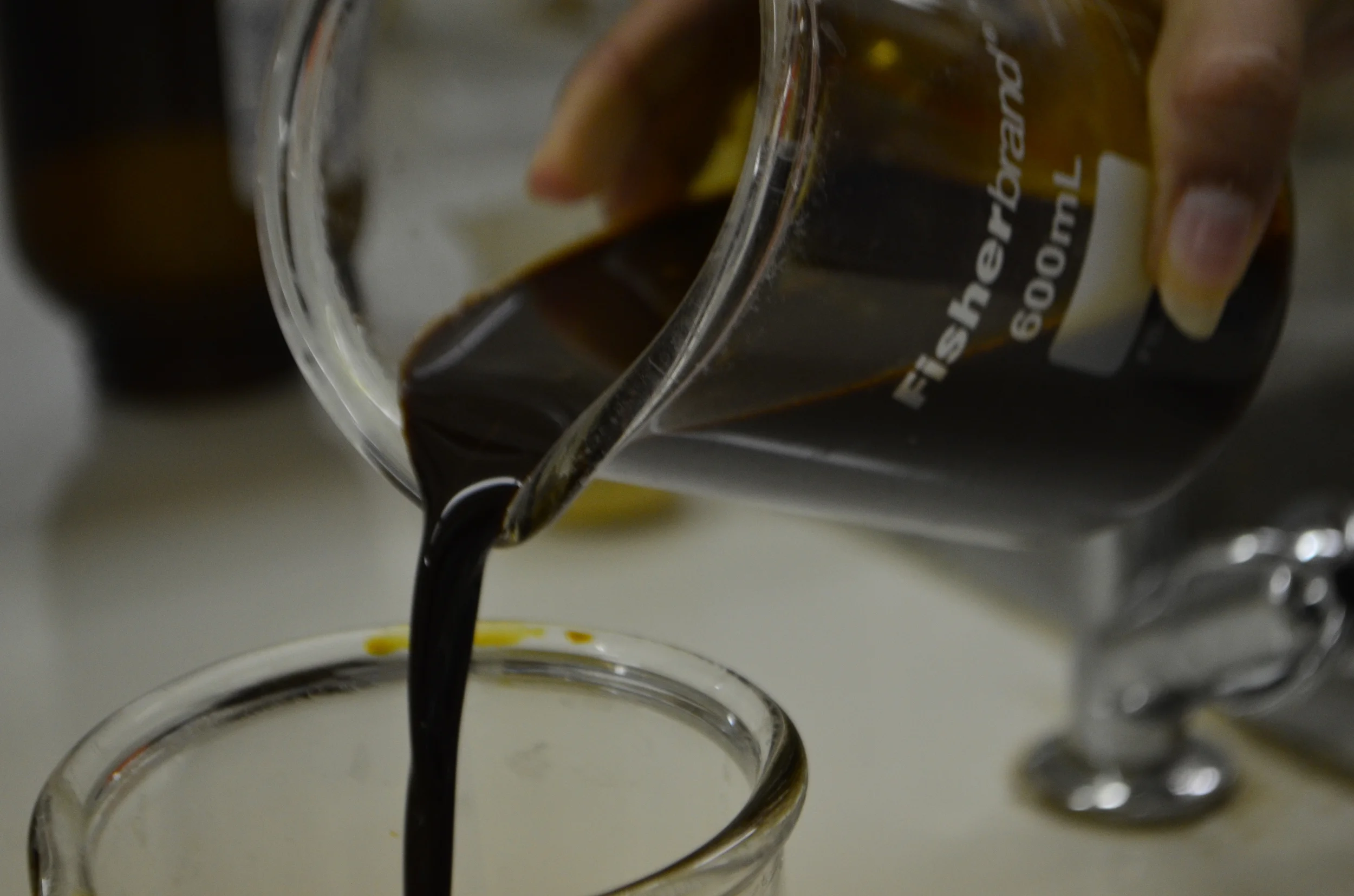Syrup containing 65 to 68 percent solids which must be concentrated further to form