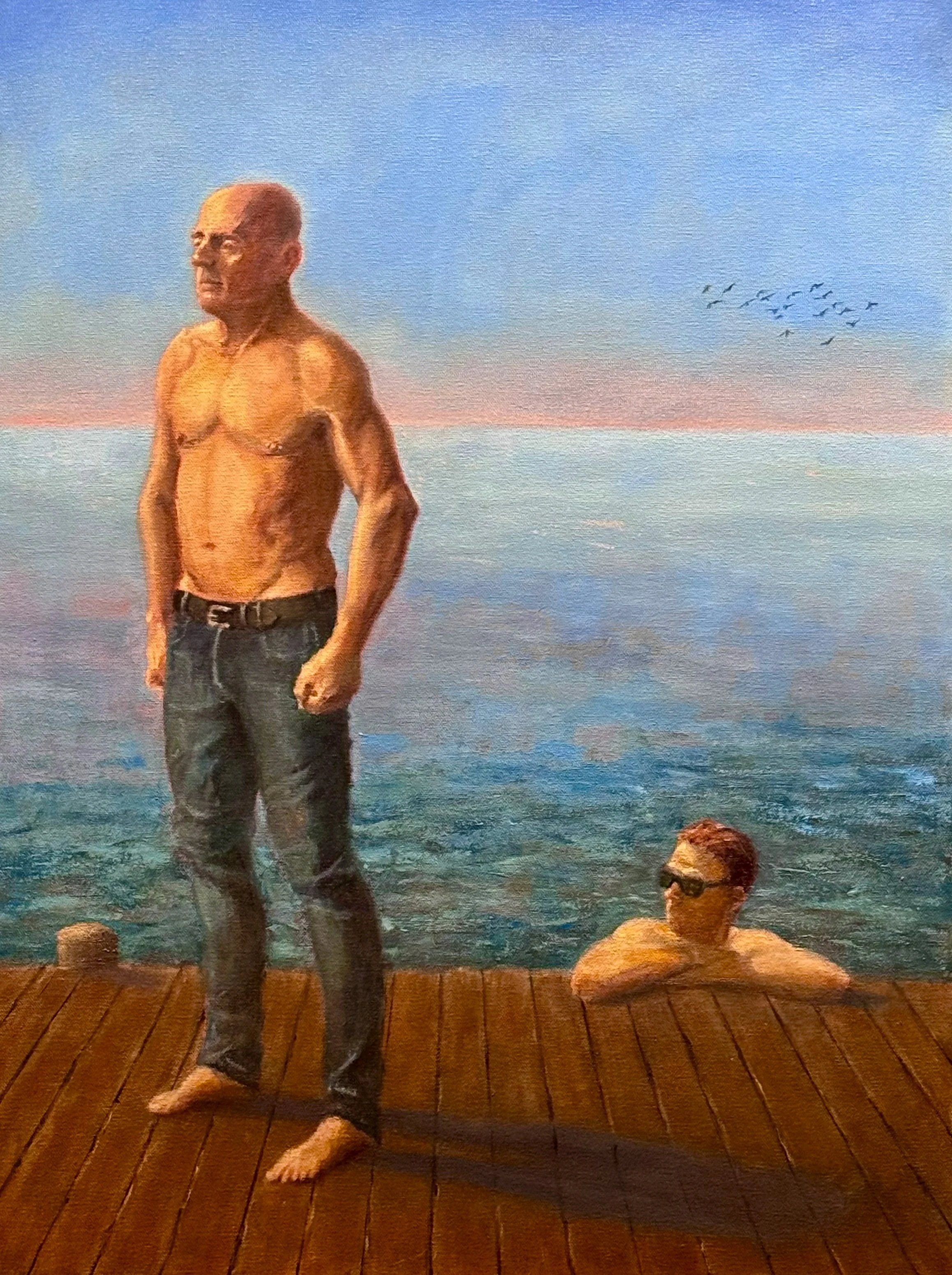 An older man stands barefoot on a dock while a younger man emerges from the water below. Between them passes a quiet current of attention, suggesting admiration, distance, and a generational encounter along the same shoreline.
