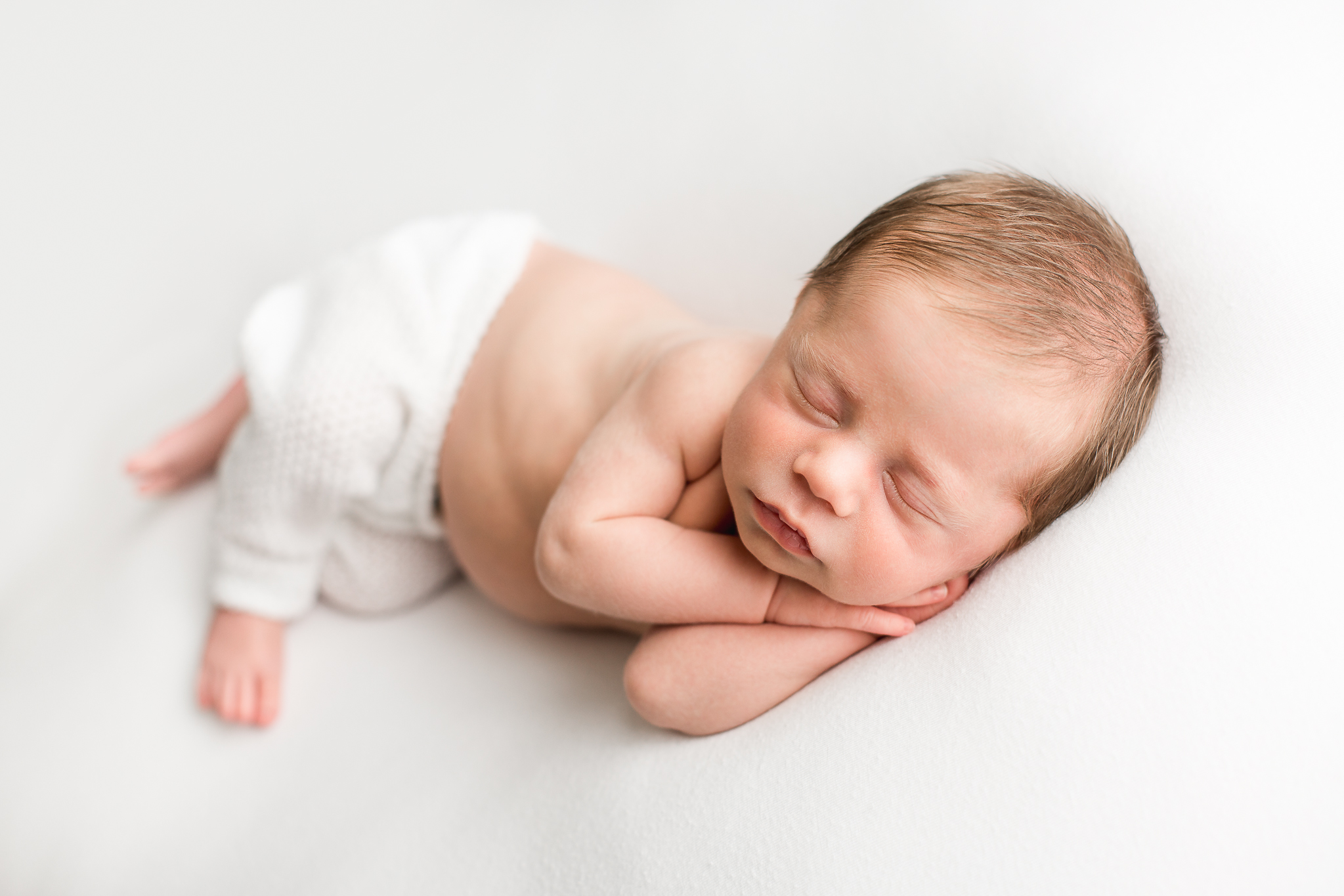 I offer newborn photography in my Grove City, Ohio residential studio