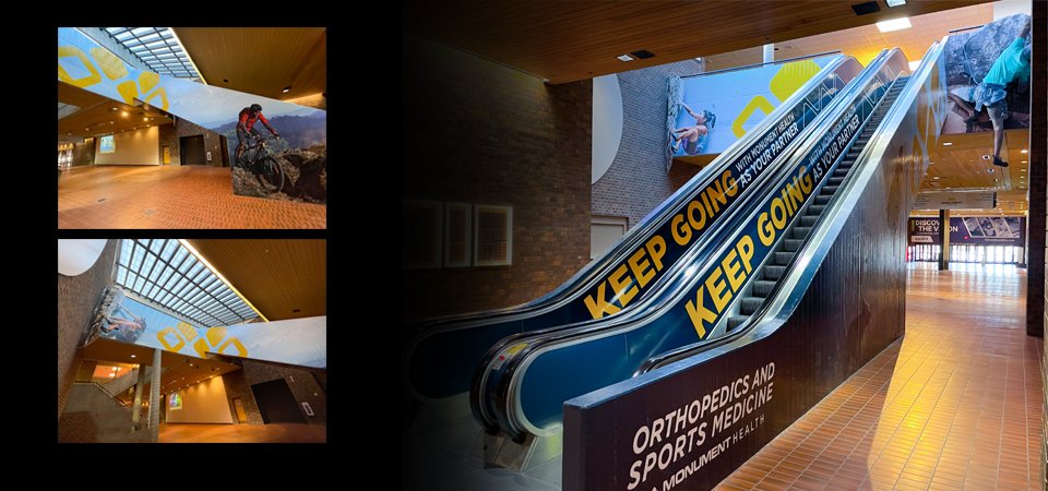  Monument escalator and wall wrap with printed and heat bent PVC 3D rock climbers 