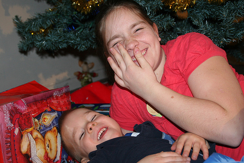 family-on-the-edge-photo-of-daughter-and-son-at-christmas-three.jpg