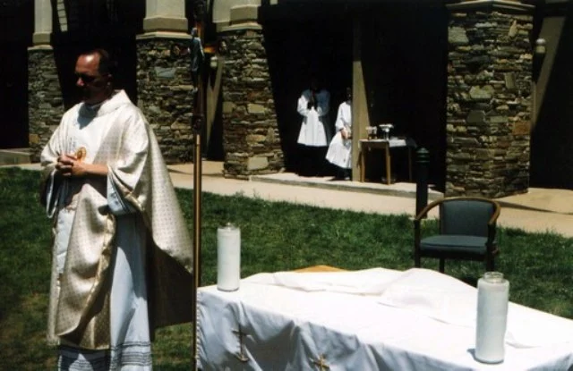 mini-Fr. Tom at Reunion Mass.jpg