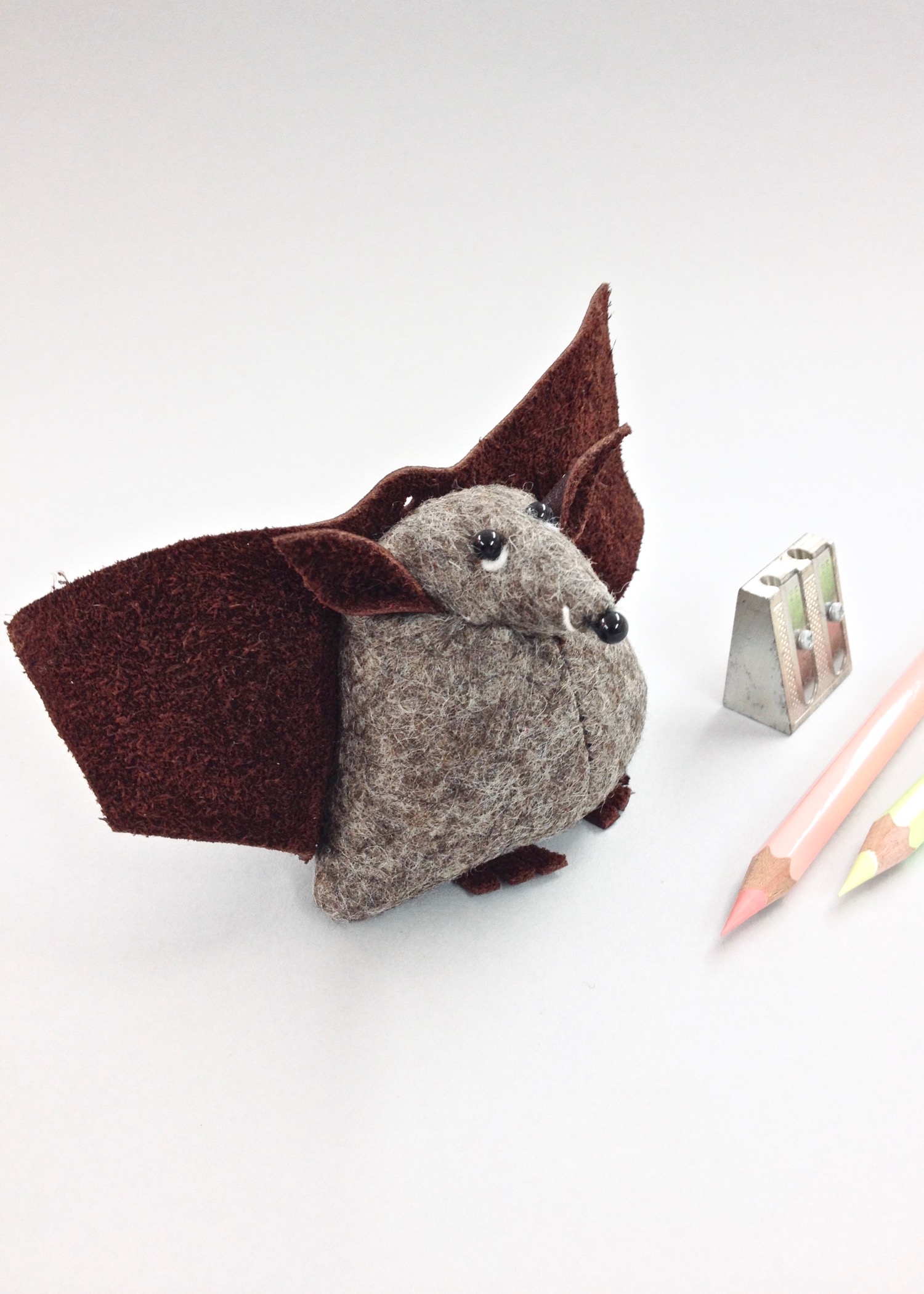 Benny the Bat felt soft sculpture paperweight by Laura Mirjami | Mirjami Design.