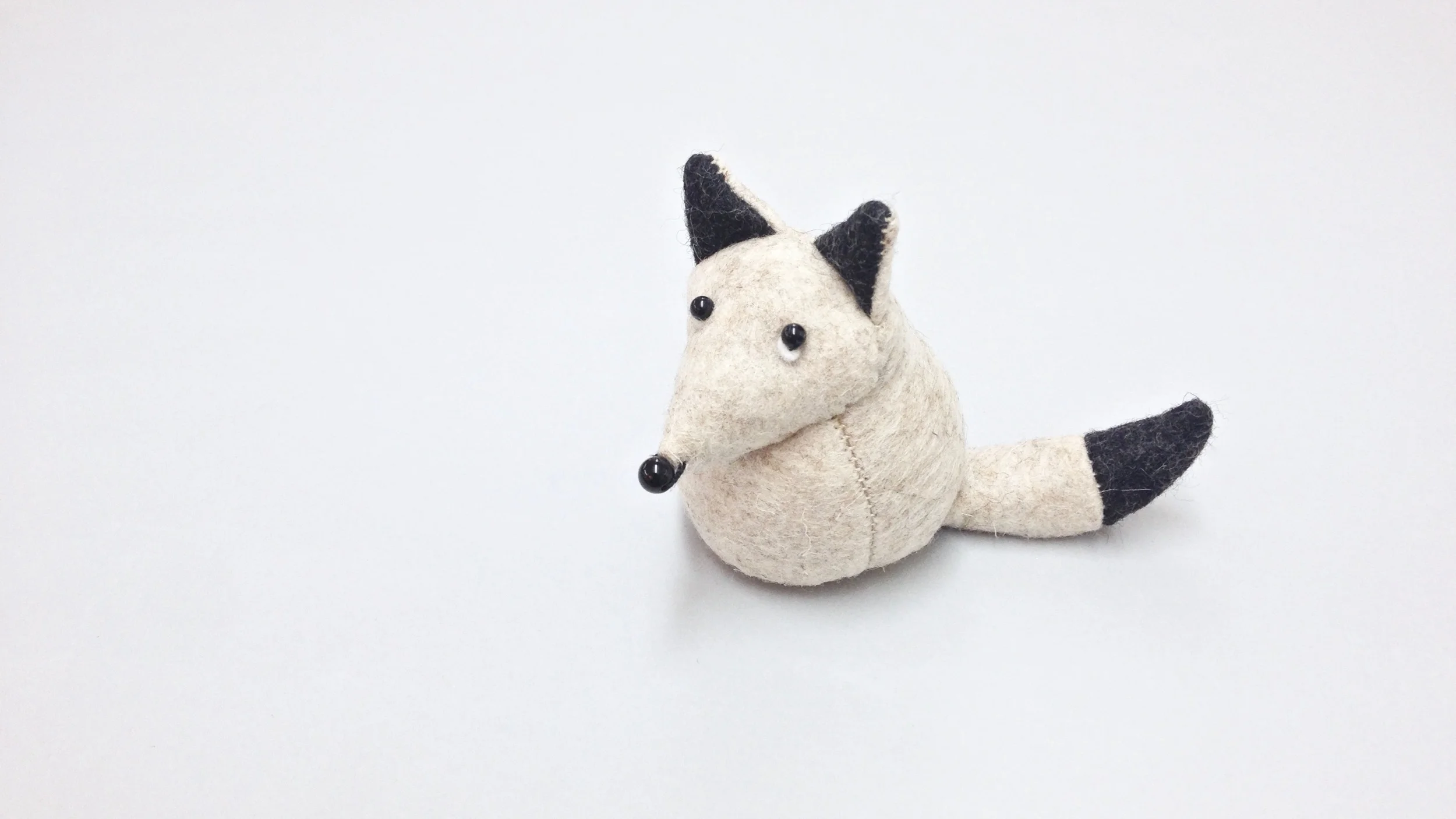Bilberry Woods storybook character Fleming the Arctic Fox handmade from wool felt by Laura Mirjami | Mirjami Design.jpg
