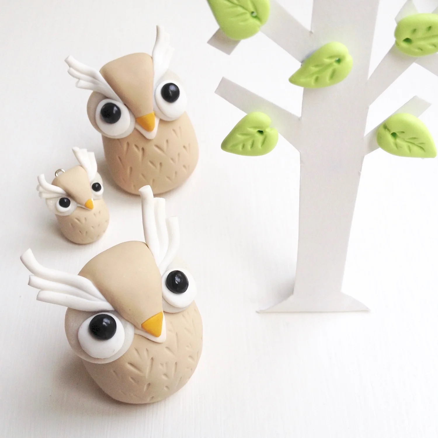 Handmade Fimo polymer clay owl figurines by Laura Mirjami