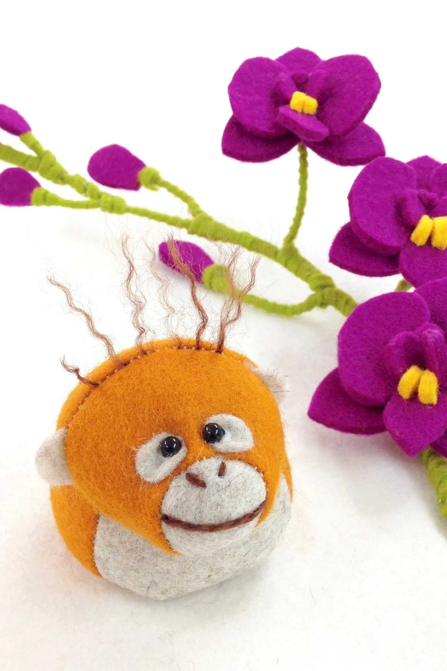 Bilberry Woods character Oscar the Orangutan felt paperweight handmade by Laura Mirjami | Mirjami Design..jpg
