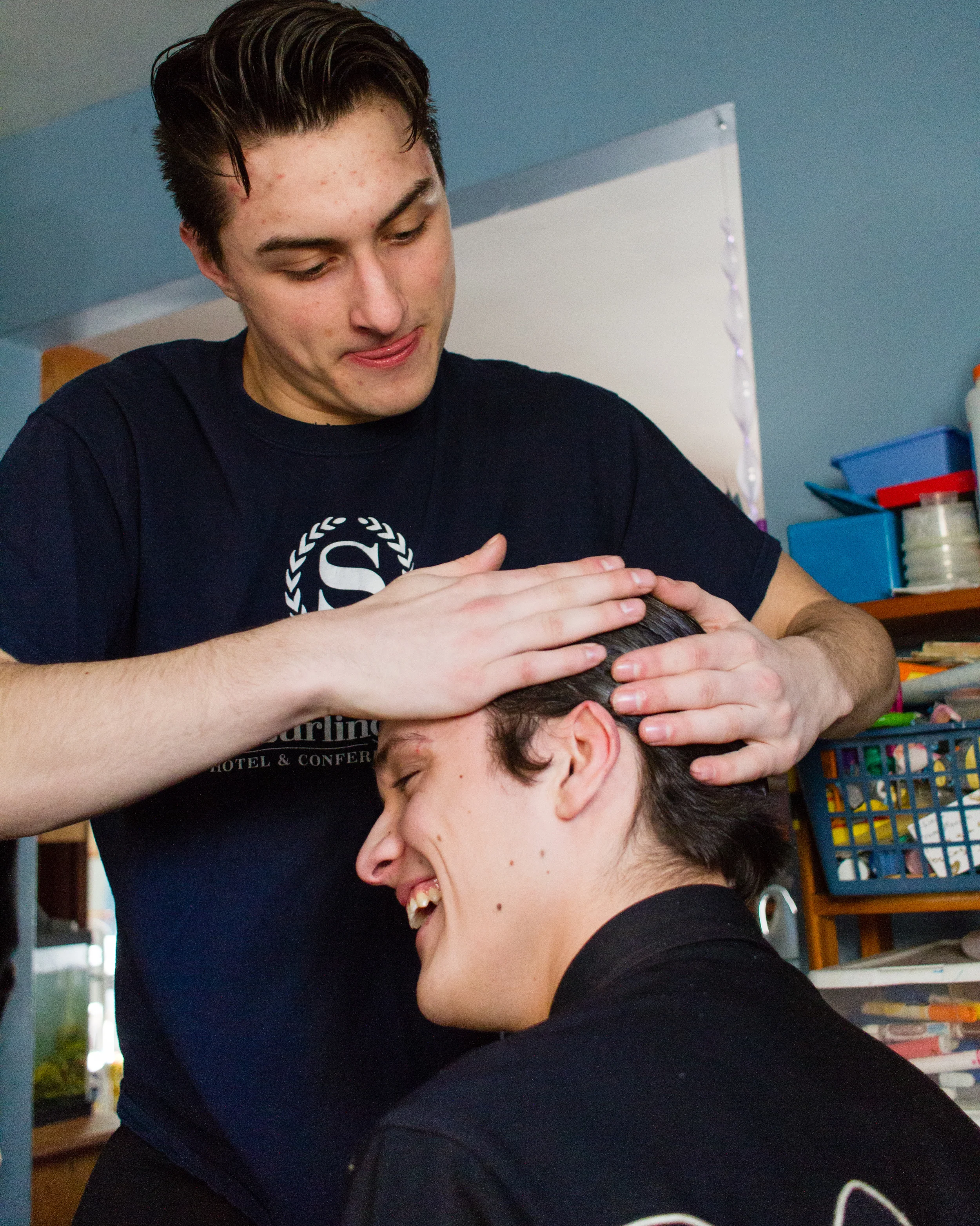 Calvin, future barber, works his magic.